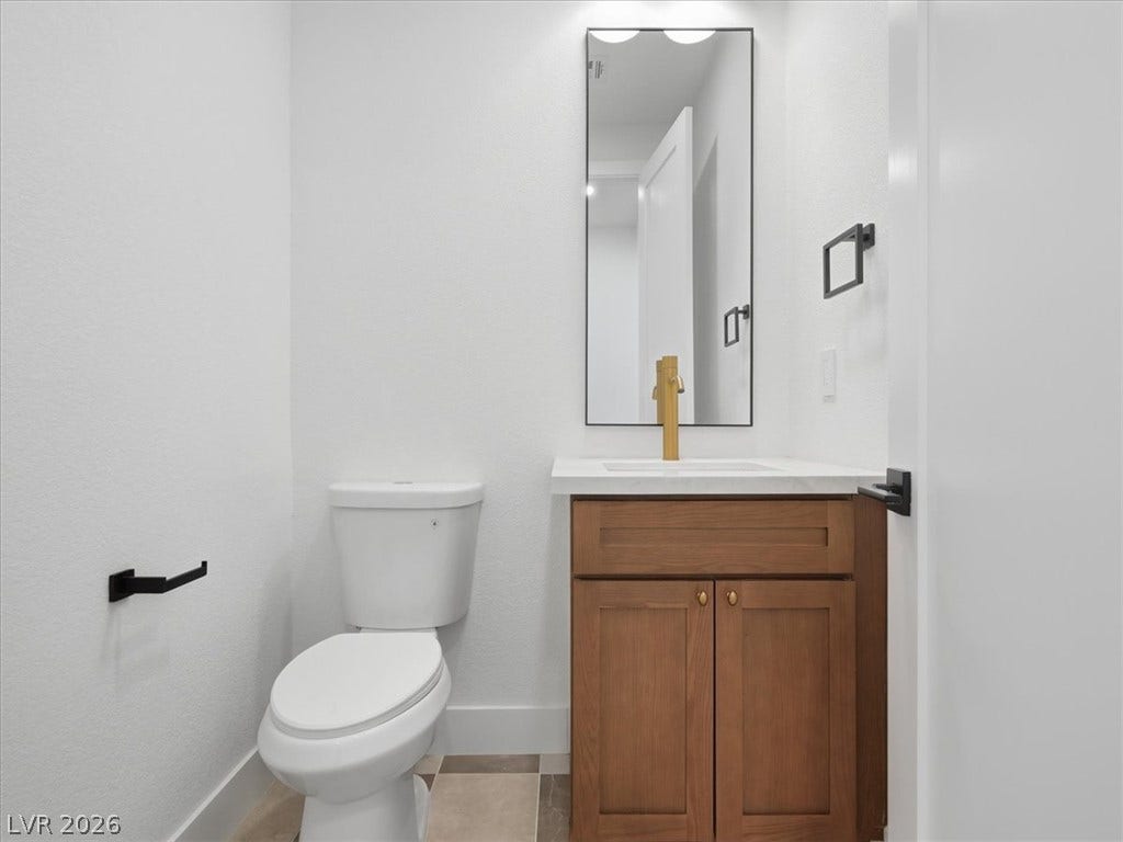 3074 Soft Horizon Way, Las Vegas, NV 89135 Modern fixtures and tile flooring elevate this pristine bathroom space.