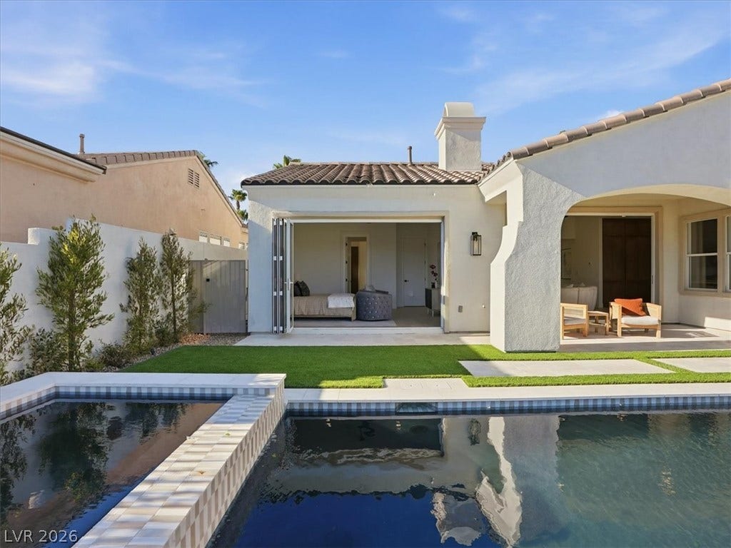 3074 Soft Horizon Way, Las Vegas, NV 89135 An inviting private pool and lounge area complement the home's contemporary aesthetic.
