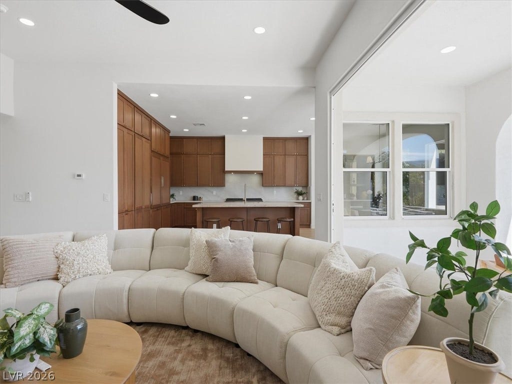 3074 Soft Horizon Way, Las Vegas, NV 89135 An inviting open-concept design seamlessly connects the spacious living area to a well-appointed kitchen.