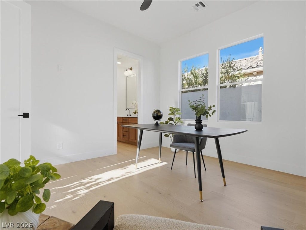 3074 Soft Horizon Way, Las Vegas, NV 89135 A well-lit study with light wood floors offers a versatile space for work or contemplation.