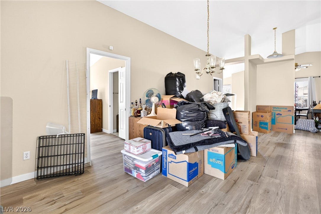4633 Sophia Way, North Las Vegas, NV 89032 Vaulted ceilings and durable wood-look flooring enhance the open feeling of this versatile interior space.