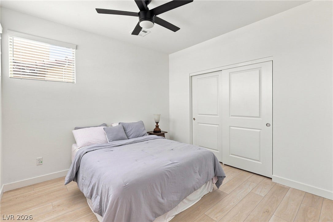 709 Emerson Creek Court, North Las Vegas, NV 89084 A quiet retreat with light wood flooring and a convenient sliding closet.