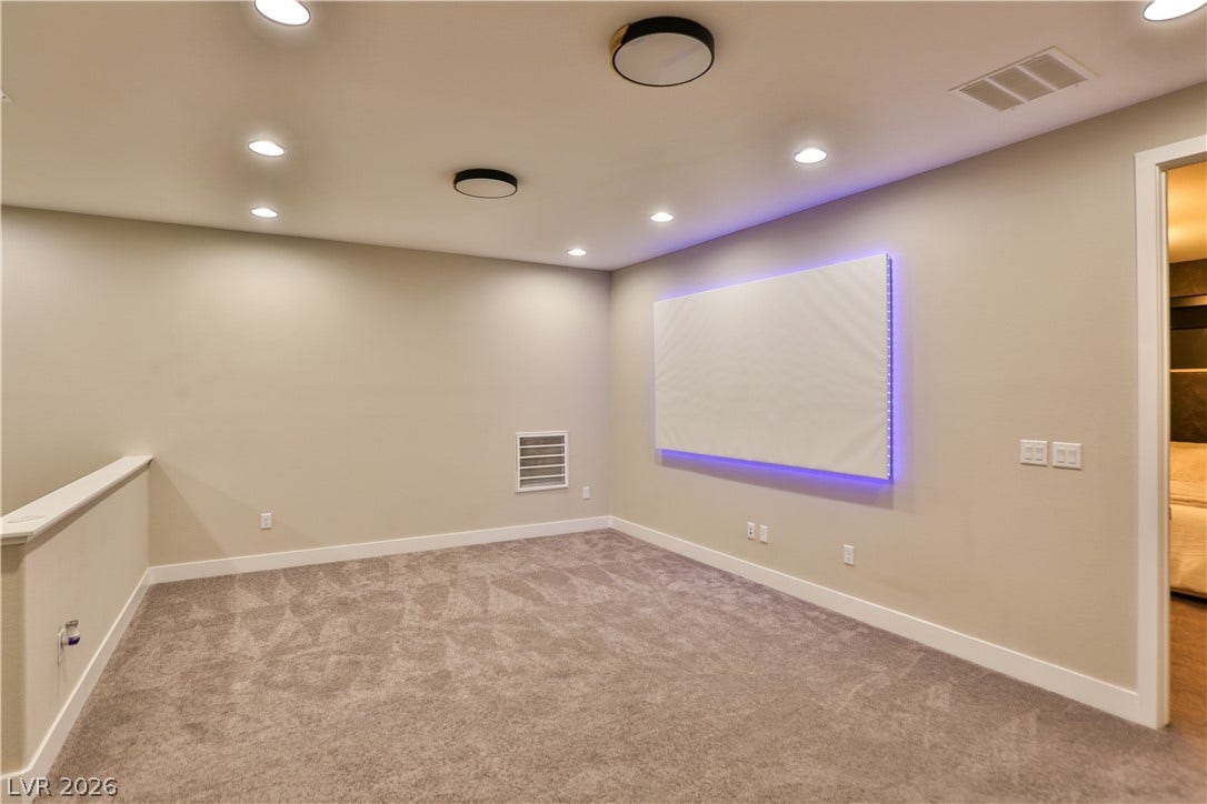 7851 W Wigwam Avenue, Las Vegas, NV 89113 Spare room with recessed lighting and light colored carpet