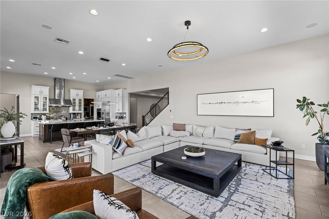 7851 W Wigwam Avenue, Las Vegas, NV 89113 Living area featuring recessed lighting and stairway