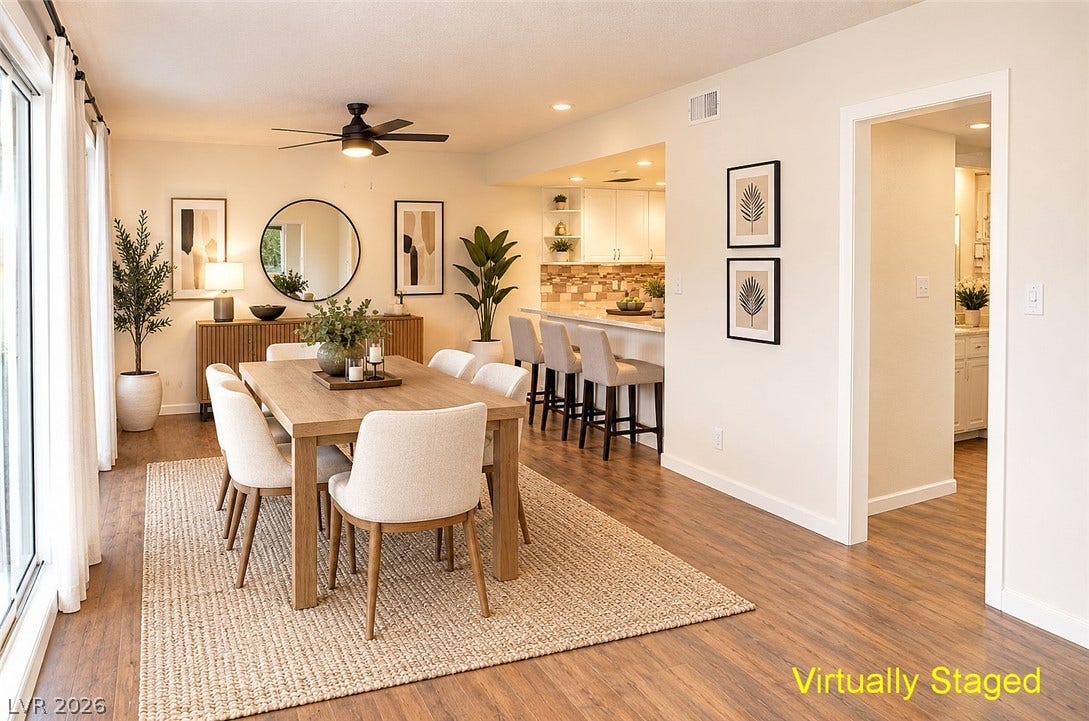 773 Cathy Lane, Henderson, NV 89015 Warm wood flooring flows through this open dining area illuminated by recessed lighting.