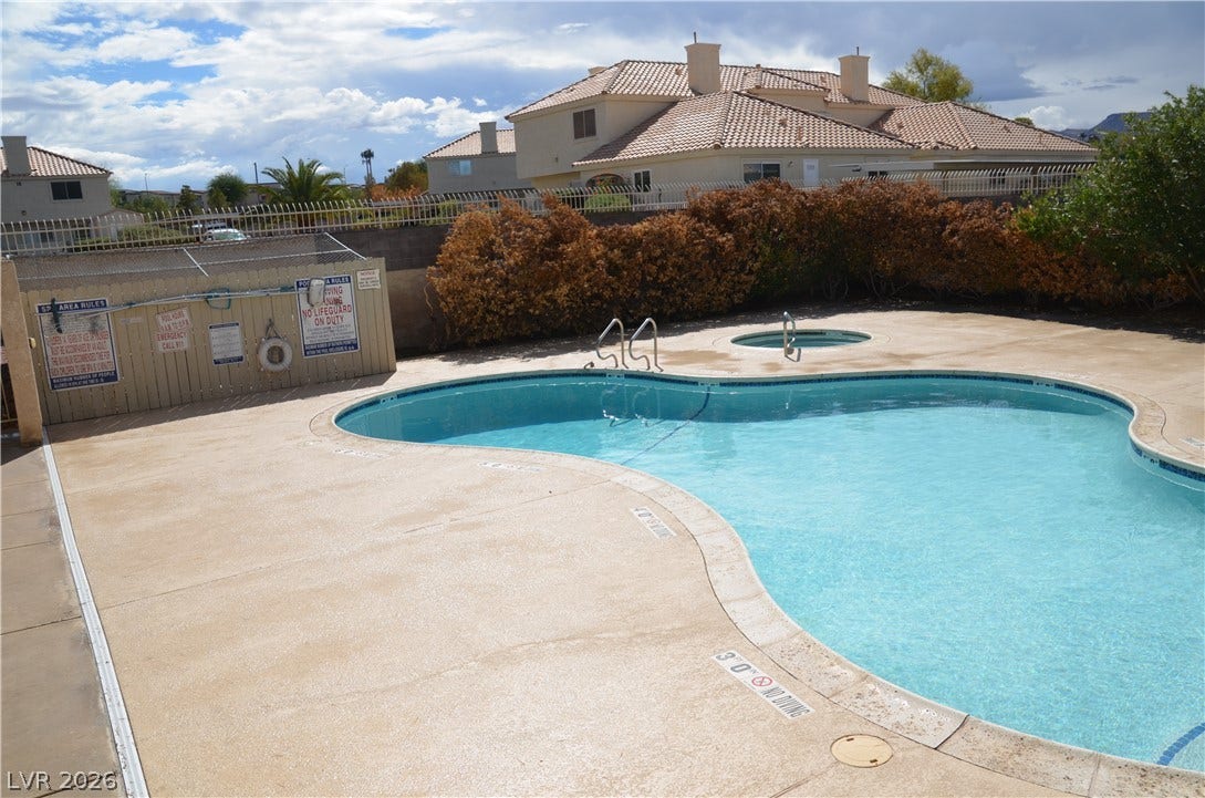 773 Cathy Lane, Henderson, NV 89015 An inviting pool and separate spa area are bordered by a concrete deck.