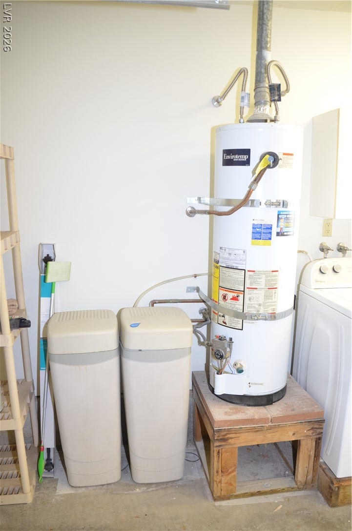 773 Cathy Lane, Henderson, NV 89015 A dedicated utility space houses the home water heating and filtration systems on durable concrete flooring.