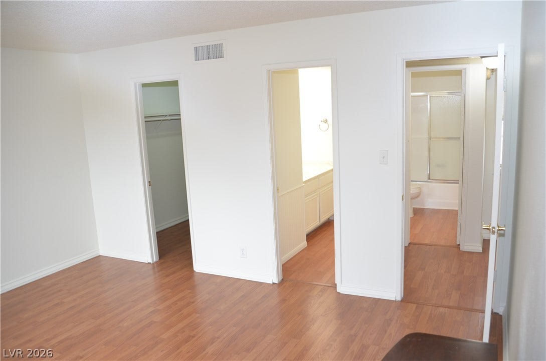 773 Cathy Lane, Henderson, NV 89015 Gleaming wood floors connect this versatile space to an adjacent closet and bathroom.