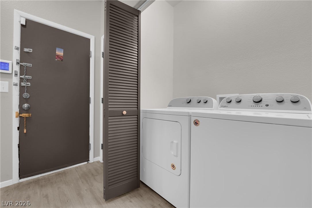 2653 Thunder Struck Court, North Las Vegas, NV 89030 A functional laundry area with durable flooring sits conveniently near the main entry door.