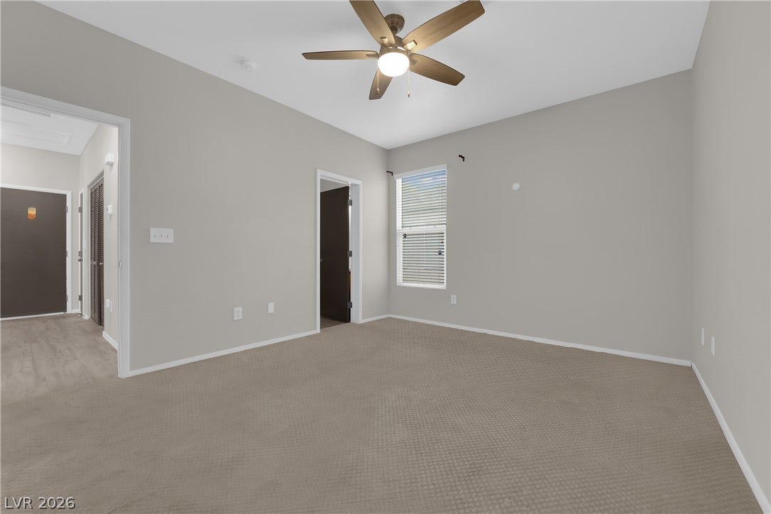 2653 Thunder Struck Court, North Las Vegas, NV 89030 Soft wall tones complement the neutral carpeting and natural light in this versatile room.