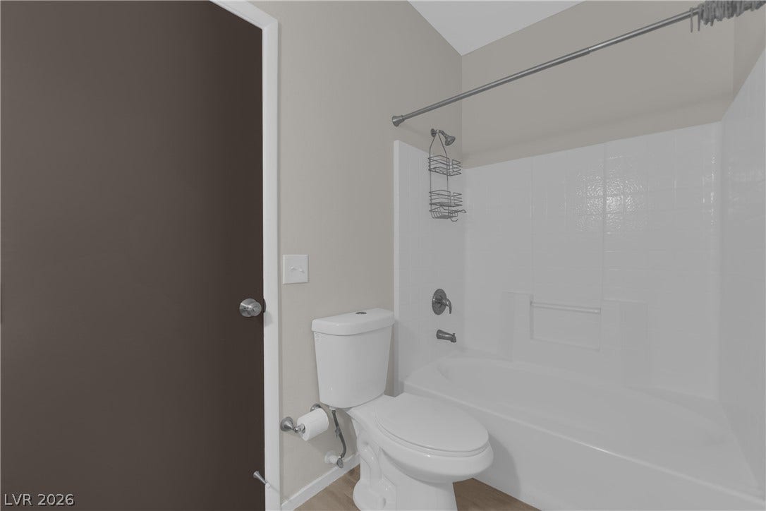 2653 Thunder Struck Court, North Las Vegas, NV 89030 Clean lines and a tub-shower combination define this functional bathroom layout.
