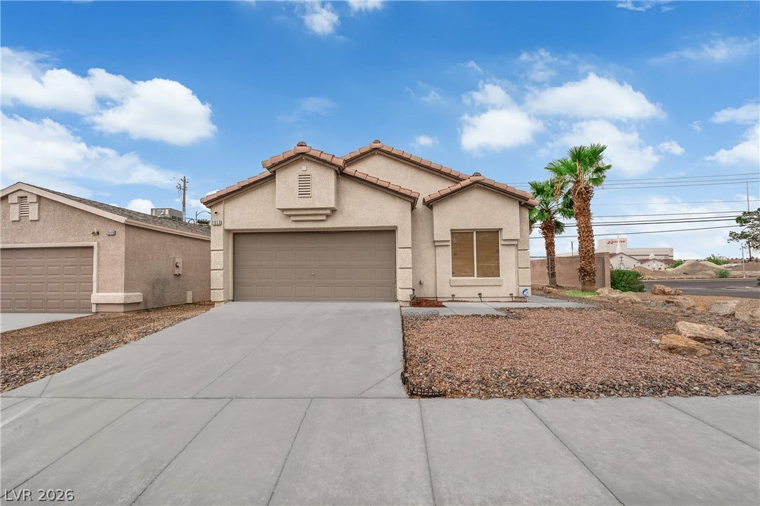 2653 Thunder Struck Court, North Las Vegas, NV 89030 Desert landscaping and a concrete driveway complement the stucco exterior of this single-story home.