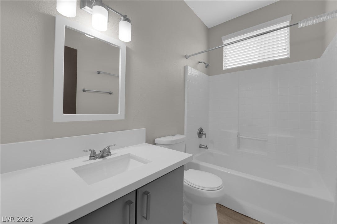 2653 Thunder Struck Court, North Las Vegas, NV 89030 Clean lines and a modern vanity define this updated full bathroom.