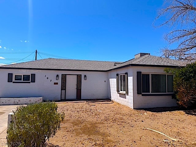 107 Joshua Street, Henderson, NV 89015 A classic single-story exterior features clean masonry walls under a clear blue sky.
