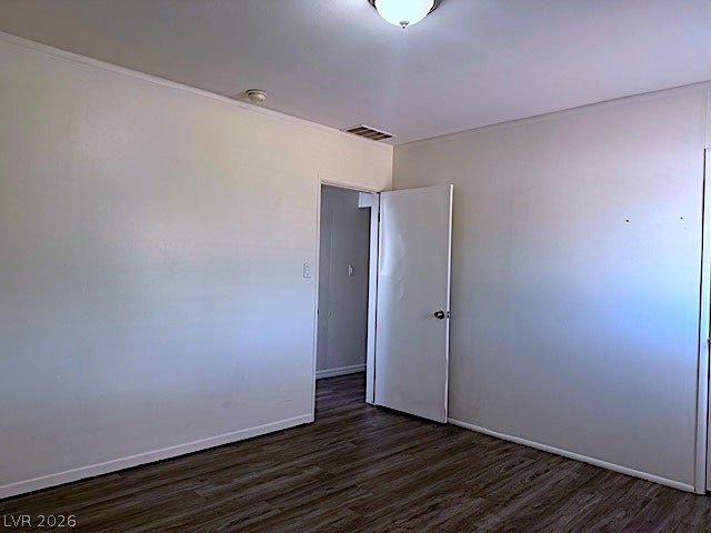 107 Joshua Street, Henderson, NV 89015 Gleaming wood-look floors anchor this versatile room boasting clean-lined walls and a classic overhead light.