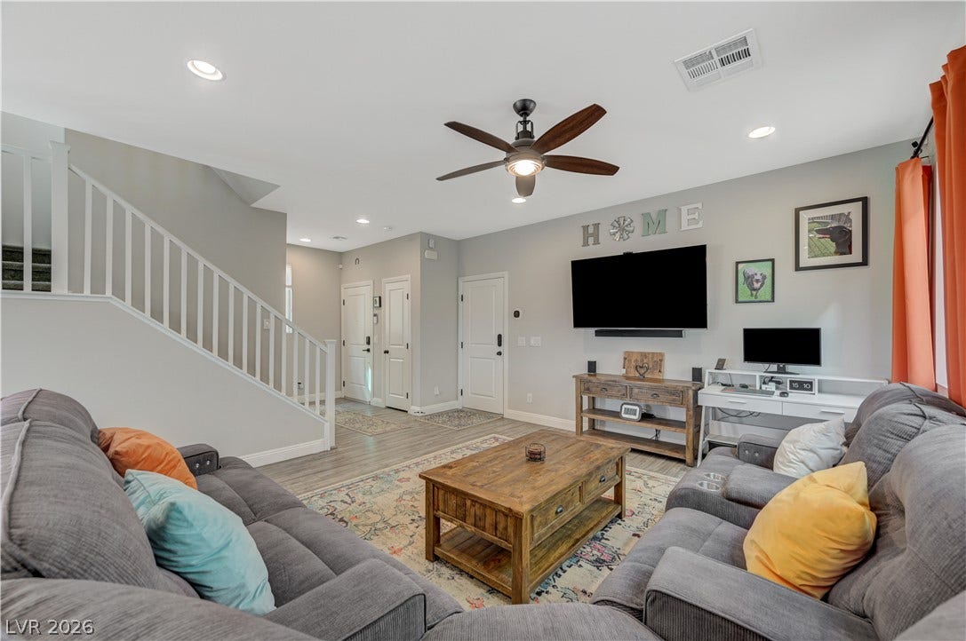 6629 Rockhouse Street, North Las Vegas, NV 89086 An open floor plan layout connects the comfortable living area with the adjacent entryway.