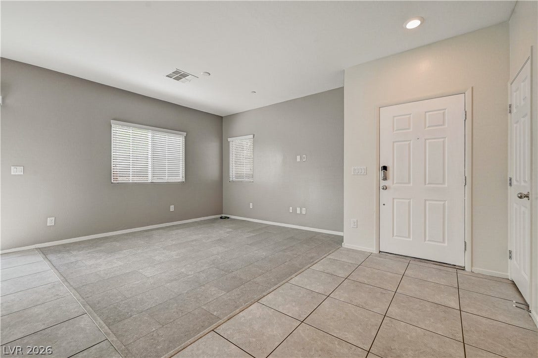 2455 Sunflower Days Avenue, #1056, North Las Vegas, NV 89031 Tiled flooring and neutral walls create a clean foundation in this welcoming entryway.