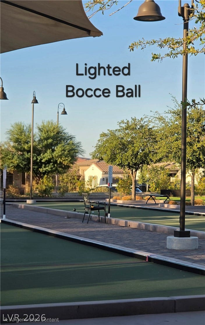 752 Dorsey Falls Street, Henderson, NV 89011 Professional-grade bocce ball courts offer recreation under the warmth of integrated outdoor lighting.