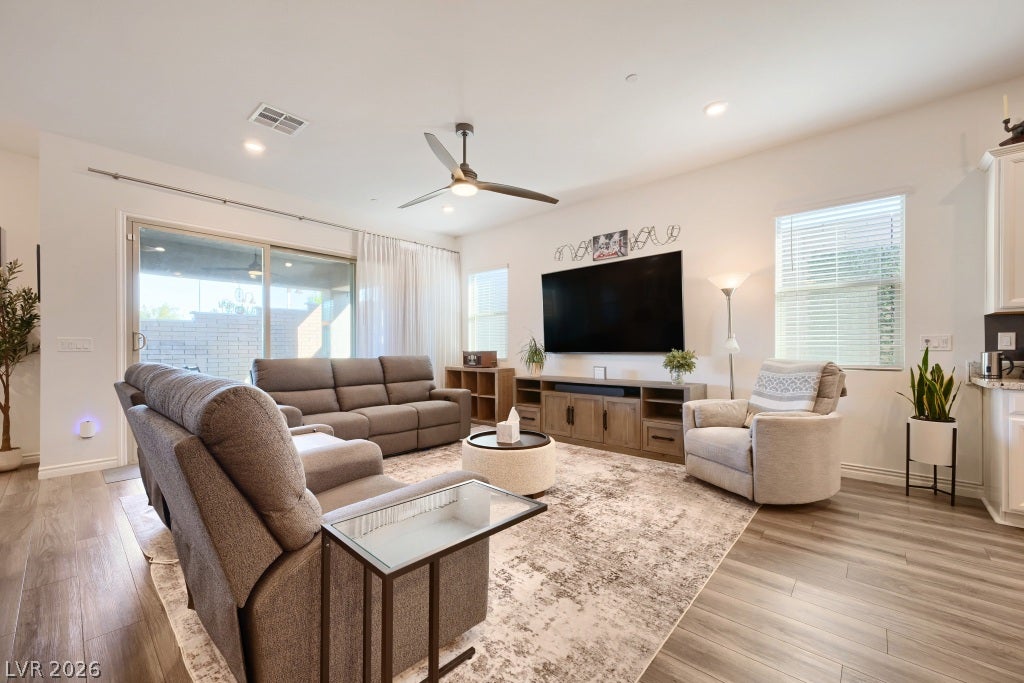 752 Dorsey Falls Street, Henderson, NV 89011 Sliding glass doors connect this airy living space directly to the covered patio.