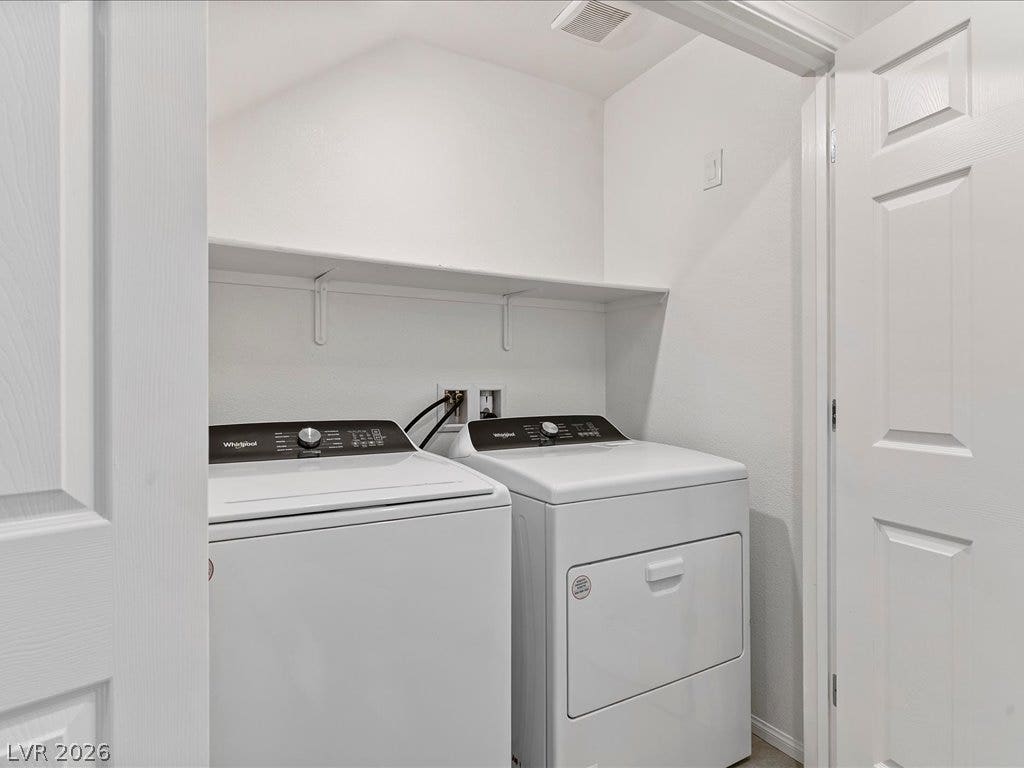 671 Foam Flower Lane, Henderson, NV 89015 Functional layout defines this dedicated laundry space complete with overhead storage shelving.