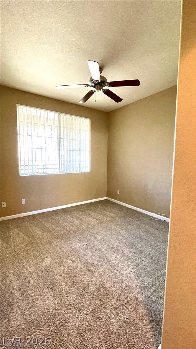 1617 Queen Victoria Street, #201, Las Vegas, NV 89144 Soft wall-to-wall carpeting and a wide window create a comfortable, inviting atmosphere.