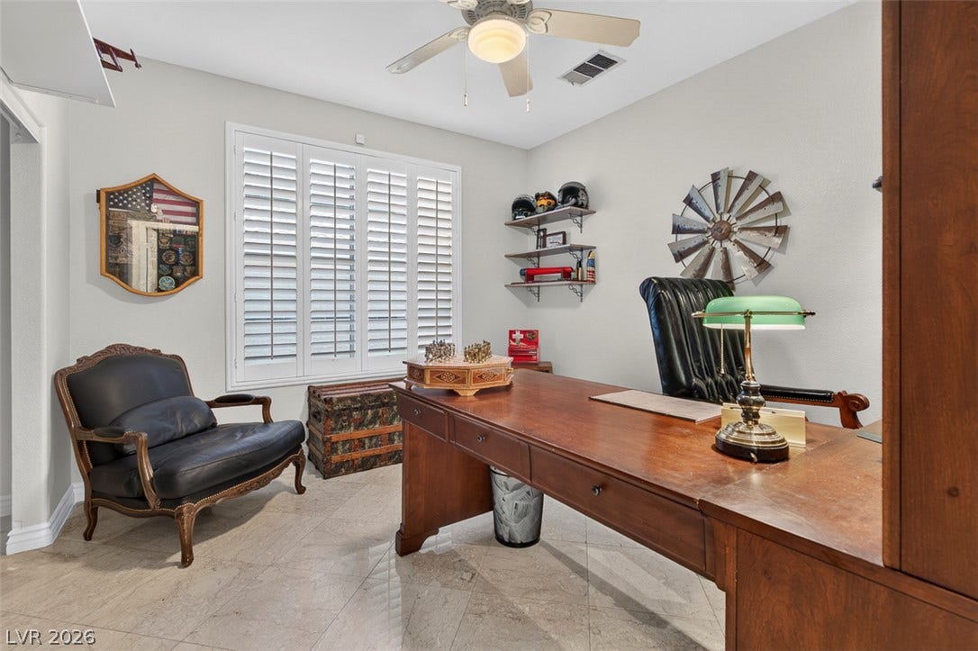 9529 Grand Canal Drive, Las Vegas, NV 89117 First floor bedroom, used as an office. Full bath/shower across the hall