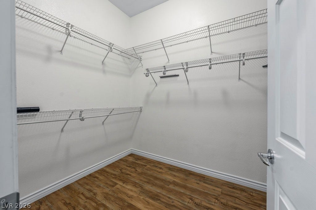 Functional closet with ample storage provides practical organization solutions.