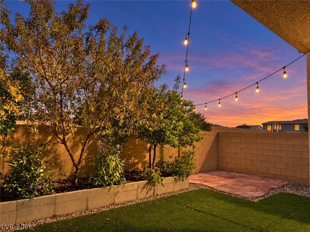142 Antimony Avenue, Las Vegas, NV 89183 Hang out in your backyard that includes fruit trees