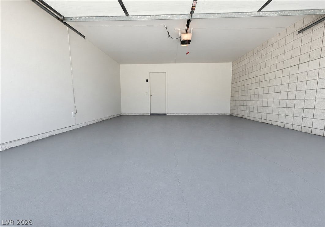 3708 Heritage Avenue, Las Vegas, NV 89121 An immaculate garage features finished walls and a durable, newly painted concrete floor.