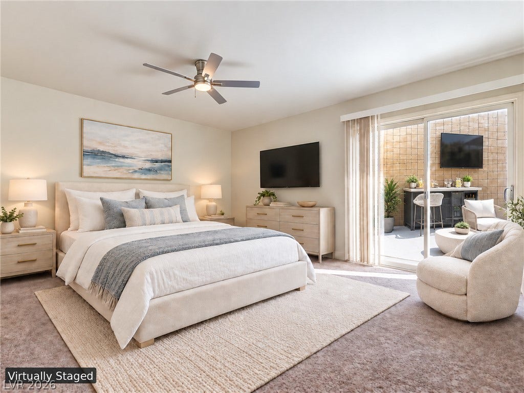 3708 Heritage Avenue, Las Vegas, NV 89121 Sliding glass doors open directly to a private patio from this comfortable carpeted suite.