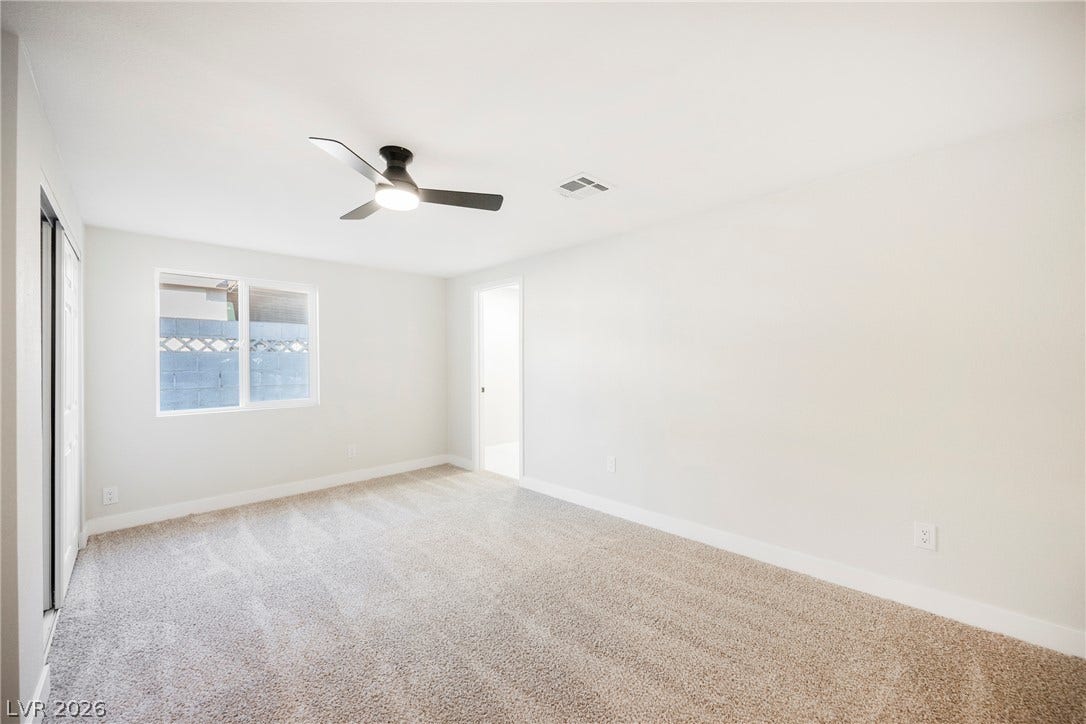 223 W Basic Road, Henderson, NV 89015 Soft carpeting pairs with crisp walls under a smooth, clean ceiling.