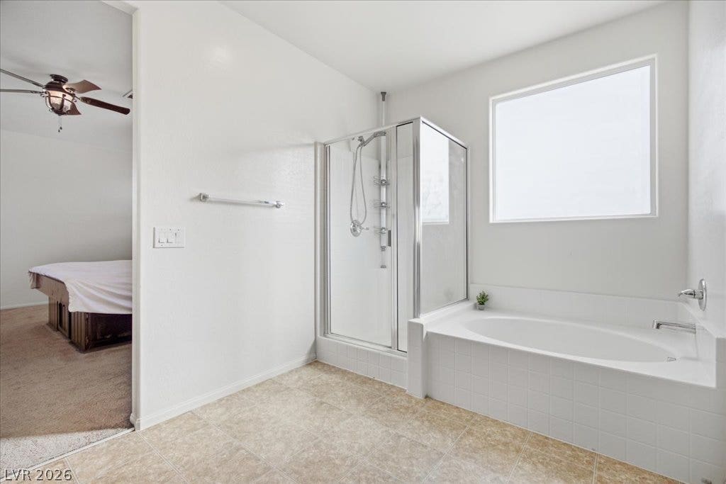 Clean lines and a spacious soaking tub highlight this master bathroom retreat.