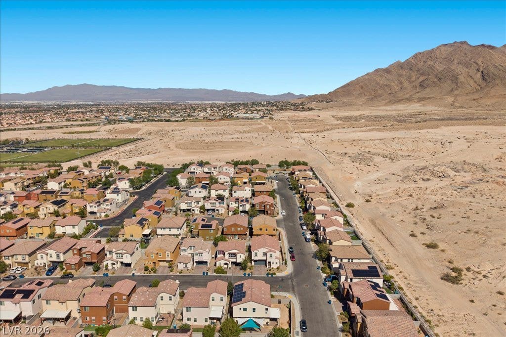 Dramatic mountain vistas frame this peaceful neighborhood setting.