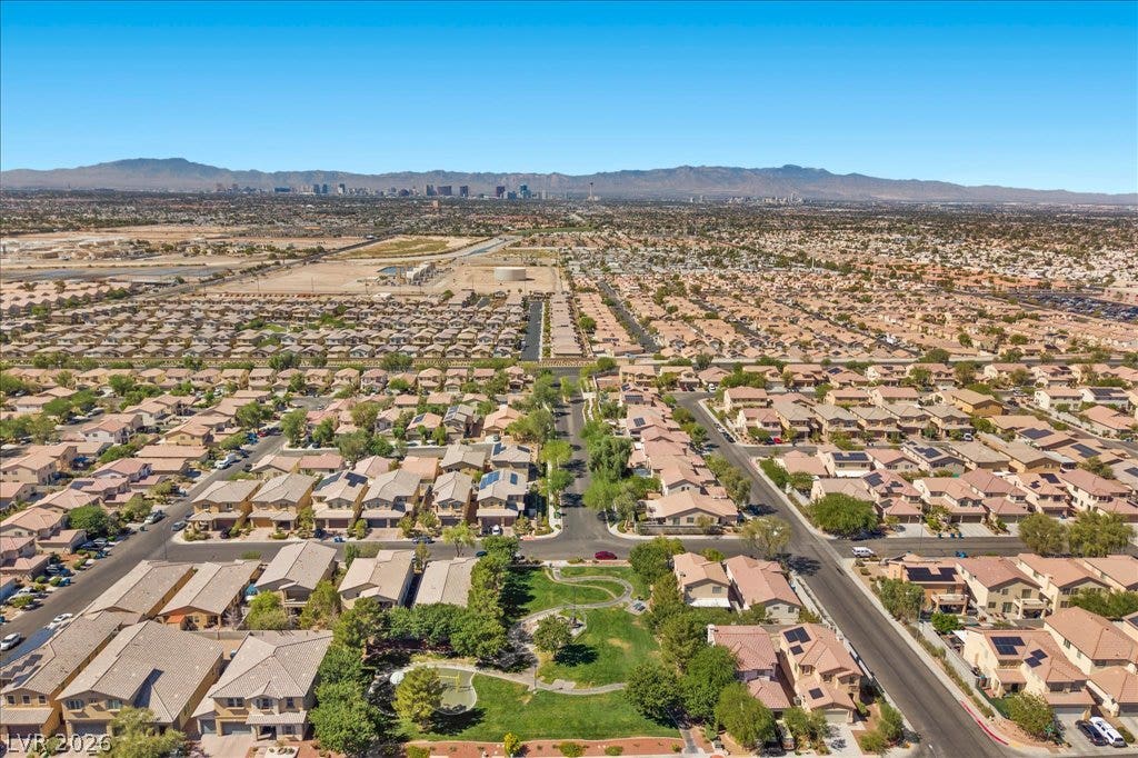 Panoramas of the city skyline and distant mountains frame this quiet residential neighborhood.