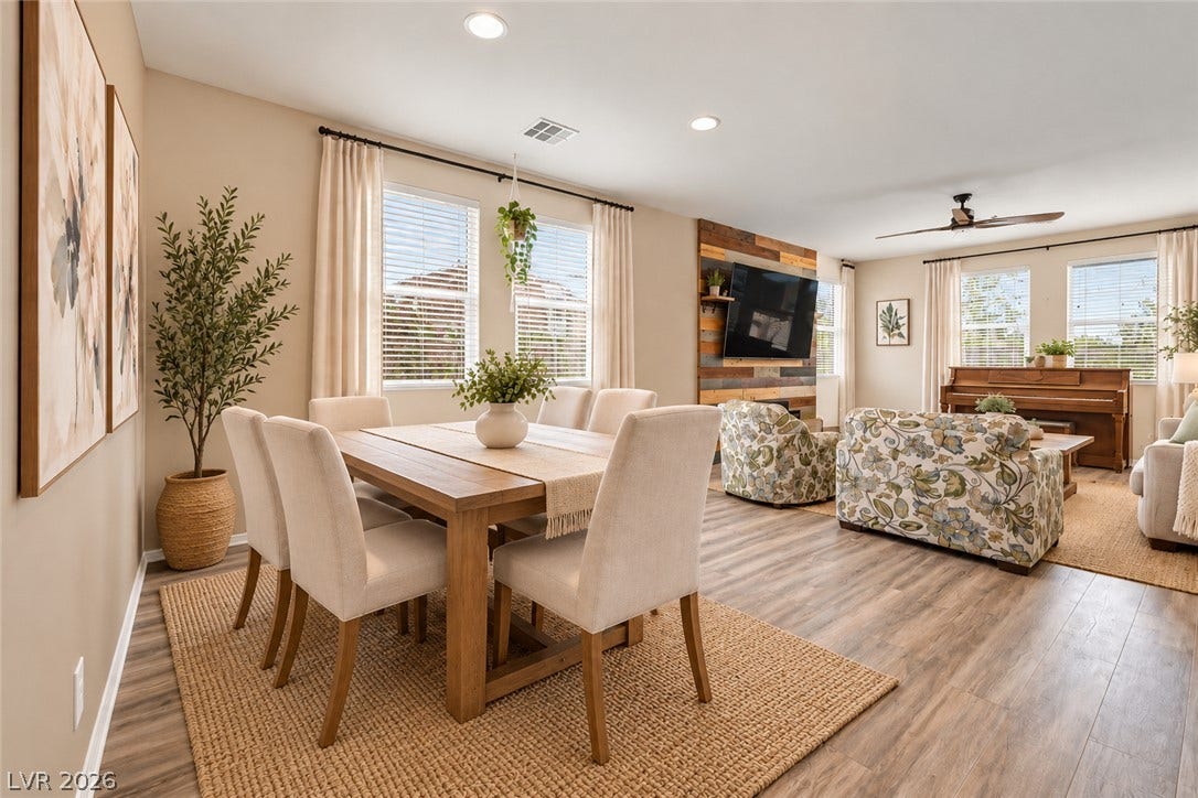 An open floorplan design seamlessly connects the dining area to living area and kitchen.