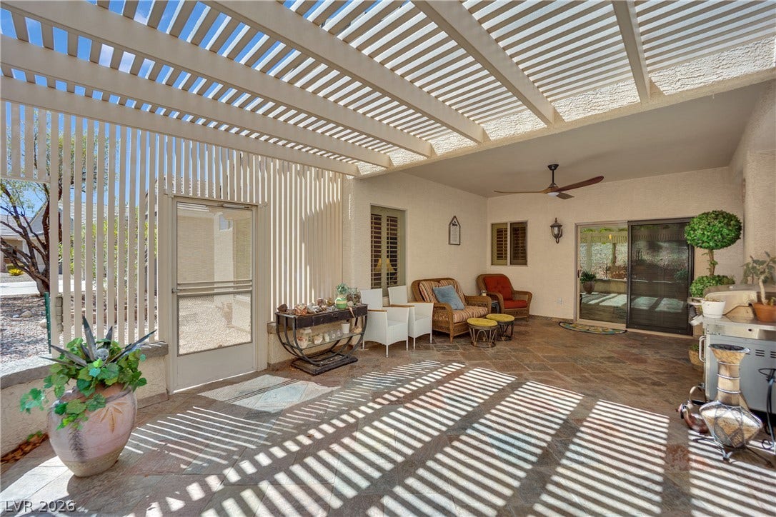 1811 Tiger Creek Avenue, Henderson, NV 89012 Enjoy true privacy under the pergola-covered patio perfect for morning coffee or evening entertaining.