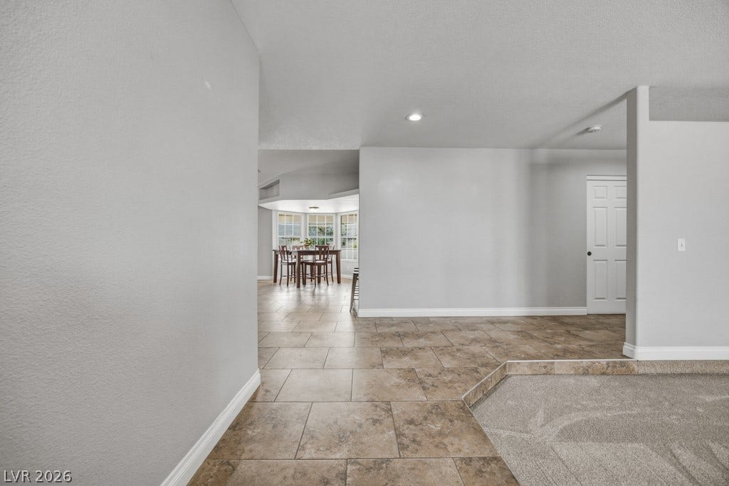 251 W Laval Drive, Henderson, NV 89015 An open, easy-flowing layout connects the front living area with the main living spaces.