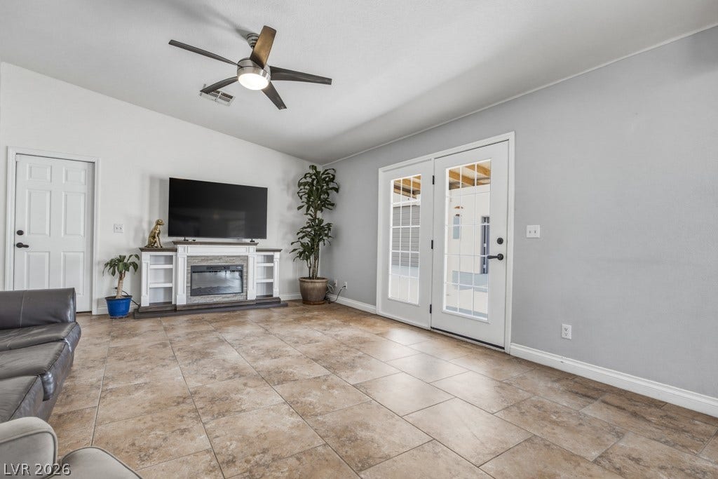 251 W Laval Drive, Henderson, NV 89015 Generous family room offers plenty of space to relax and gather.