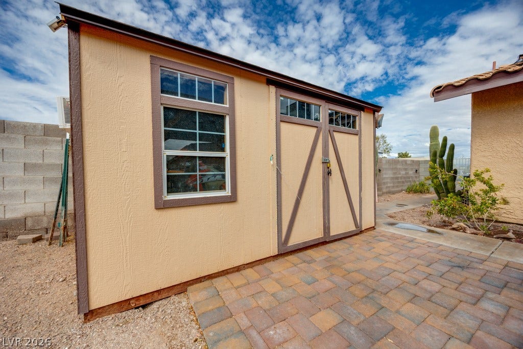 251 W Laval Drive, Henderson, NV 89015 A freestanding air conditioned storage shed provides valuable extra space for tools, outdoor equipment, seasonal items, and more.