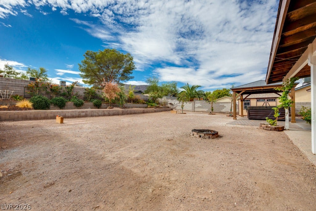 251 W Laval Drive, Henderson, NV 89015 A huge open backyard offers incredible flexibility for entertaining, recreation, gardening, pool, or creating your own outdoor retreat, with mature landscaping along the perimeter.