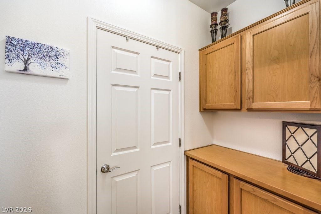 3910 Legend Hills Street, #103, Las Vegas, NV 89129 These are located between the Primary bedroom and Primary Bathroom area. Extra storage for linens and extra supplies. The door is to the walk-in closet.