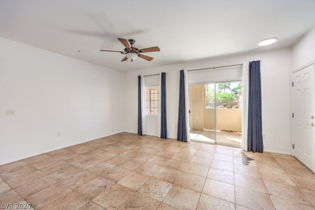 3910 Legend Hills Street, #103, Las Vegas, NV 89129 Sliding glass doors open directly to a private outdoor patio space.