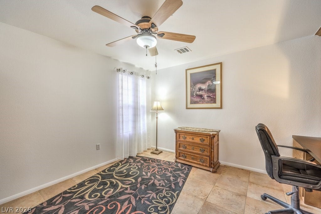 3910 Legend Hills Street, #103, Las Vegas, NV 89129 The DEN also has tile flooring and the matching ceiling fan and light.