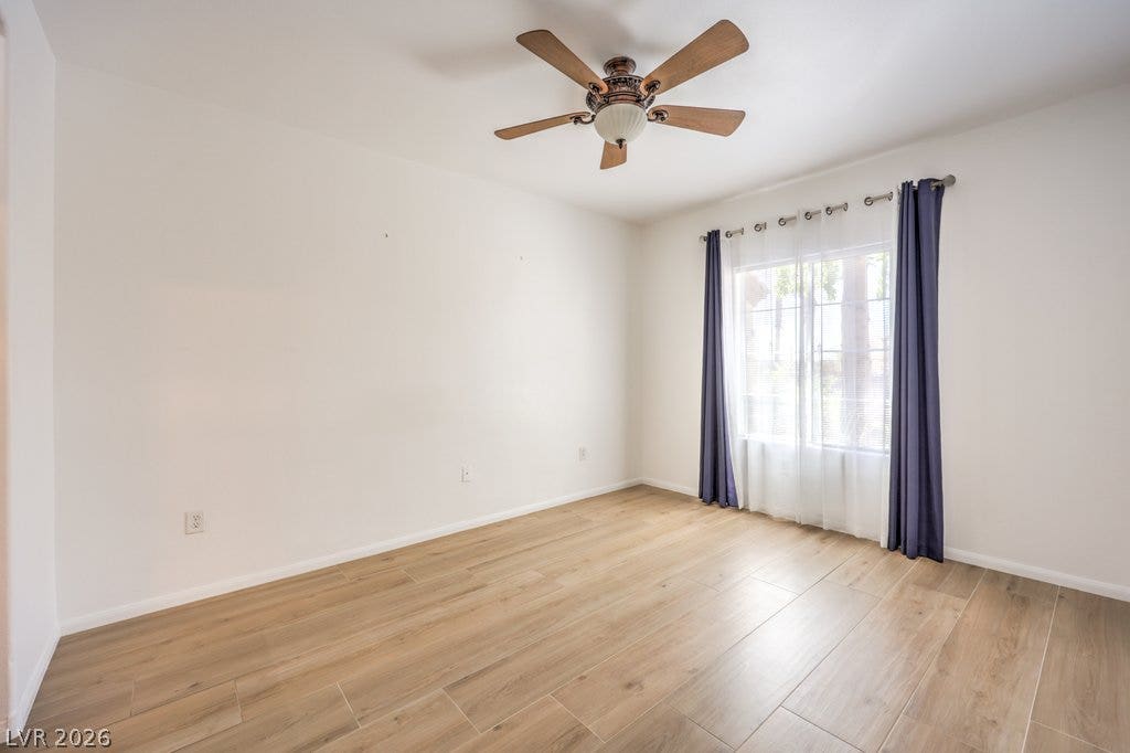 3910 Legend Hills Street, #103, Las Vegas, NV 89129 Smooth wood-look tile flooring and clean white walls await in this versatile space.