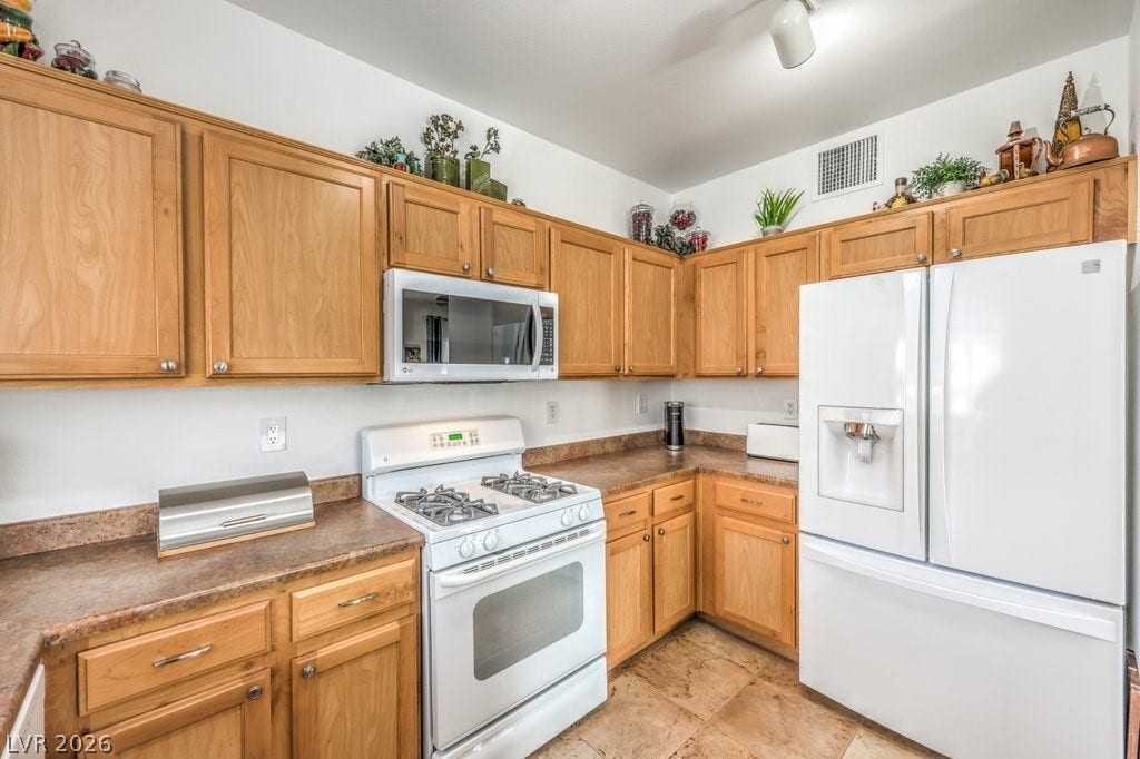 3910 Legend Hills Street, #103, Las Vegas, NV 89129 All white upgraded appliances.