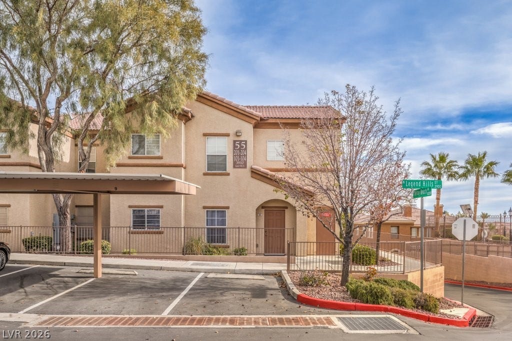 3910 Legend Hills Street, #103, Las Vegas, NV 89129 The direct entry into the condo is from the "Open Parking" spot. The "Assigned Parking" is to the left a few spots.