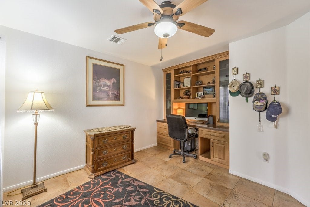 3910 Legend Hills Street, #103, Las Vegas, NV 89129 The Den offers a custom BUILT-IN cabinet with a desk, storage and shelves. Display your beautiful treasures.
