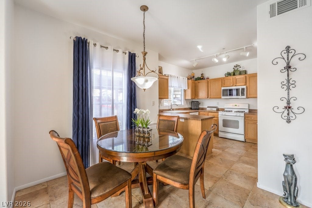 3910 Legend Hills Street, #103, Las Vegas, NV 89129 Dining room is large enough for a separate table and chairs.