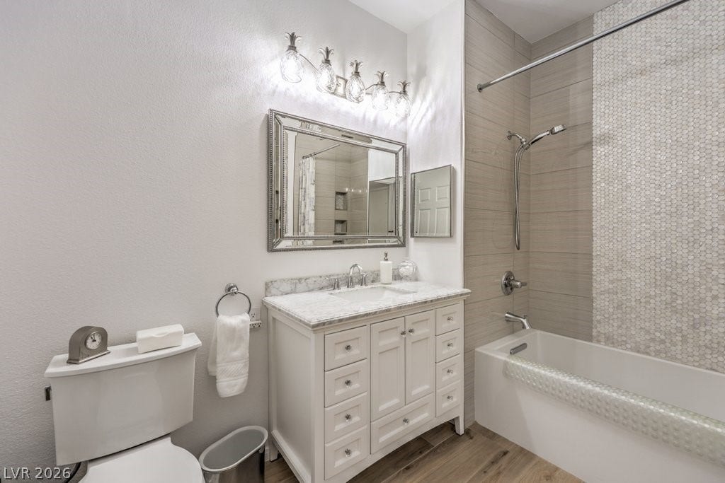 3910 Legend Hills Street, #103, Las Vegas, NV 89129 Another beautiful bathroom that is totally NEW. NEW NEW Tiled shower, cabinet, counters, faucets, mirror, lights, toilet and flooring.