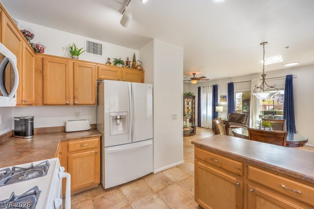 3910 Legend Hills Street, #103, Las Vegas, NV 89129 Solid surface counters. Alot of counter space for several cooks.